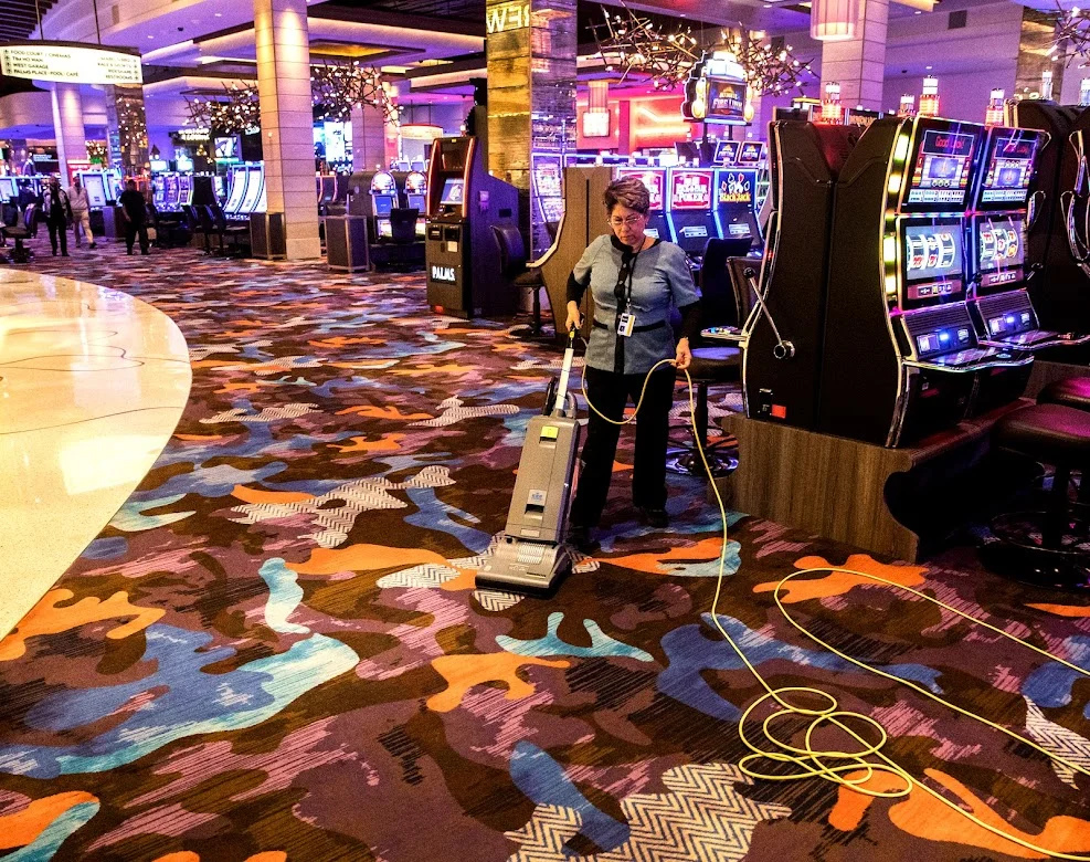 Palms casino floor with gaming tables and neon lighting
