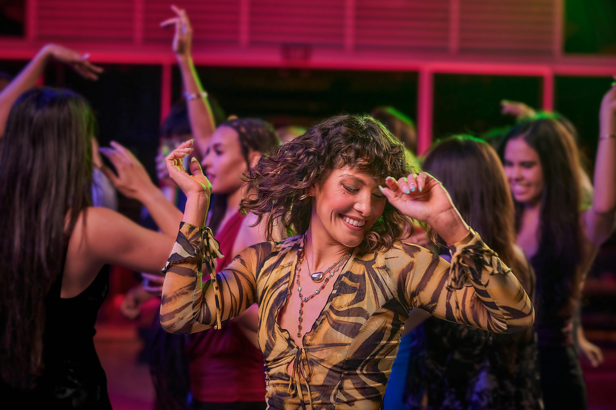 Woman dancing at Palms