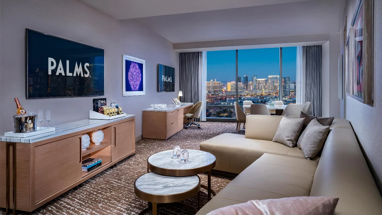 Fantasy Executive Suite living area with conference table and desk