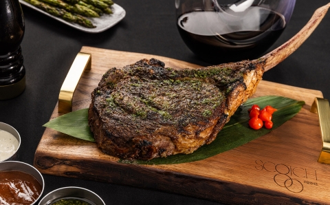 Scotch 80 Prime Steak on a cutting board