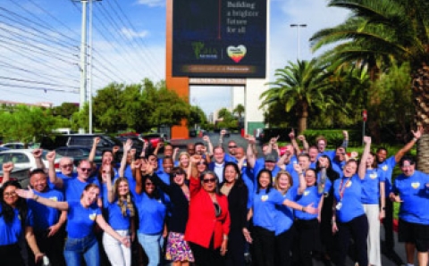 Group of people posing for a pic to celebrate the Angel Award